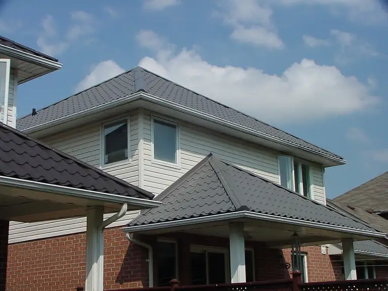 Elite steel tile metal roofing panel on a roof